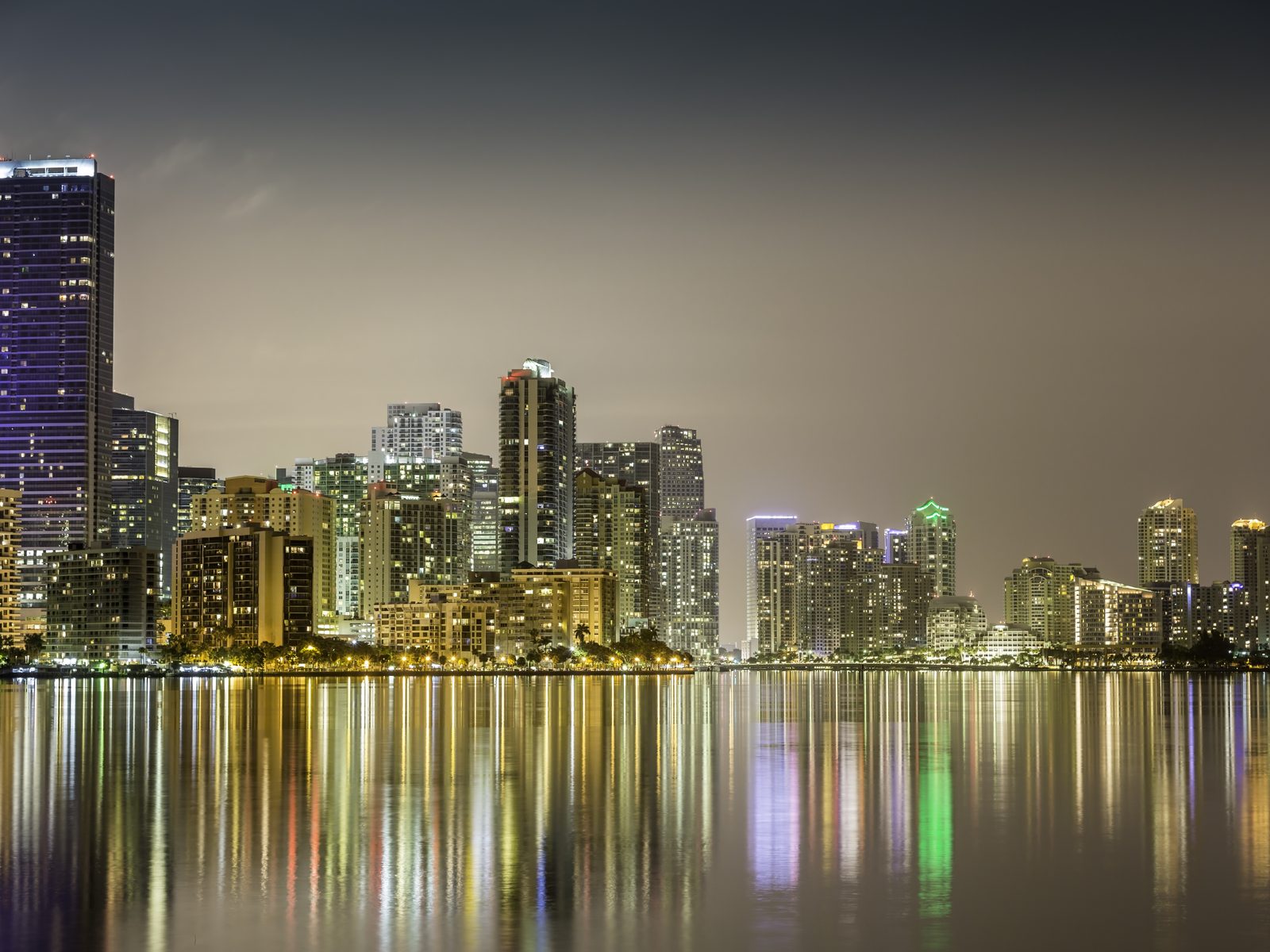 Miami skyline reflected on Biscayne Bay at dusk